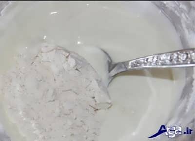 افزودن آرد به مایع زولبیا 