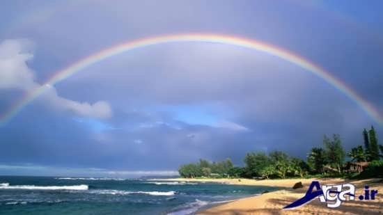عکس رنگین کمان زیبا در ساحل
