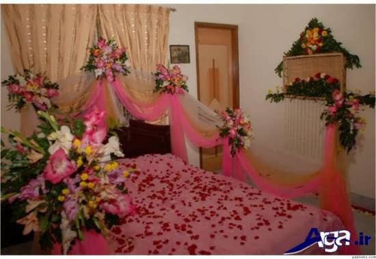 تزیین تختخواب عروس با تور و گلبرگ 