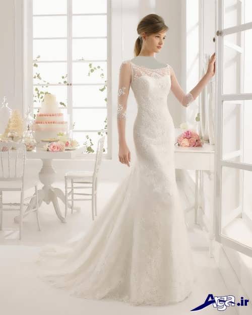 مدل لباس عروس دنباله دار آستین دار 