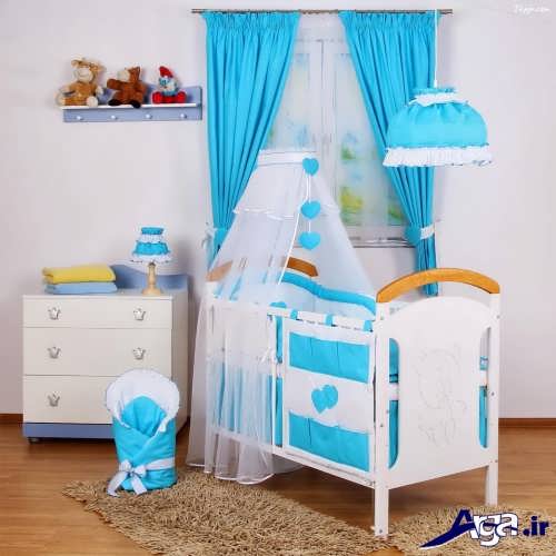 دکوراسیون آبی و سفید اتاق نوزاد 