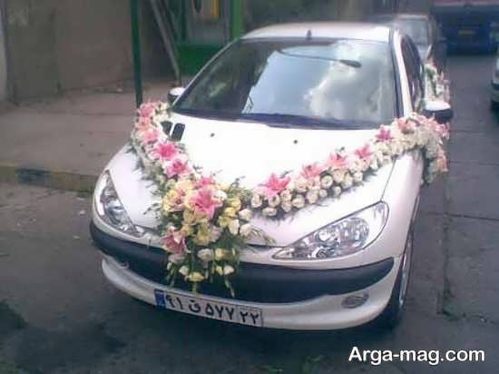 تزیین ماشین عروس با گل های رنگی 