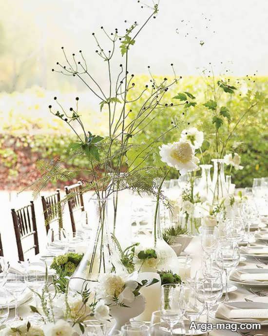 طراحی شیک میز شام عروسی با گل