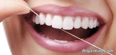 کشیدن صحیح نخ دندان