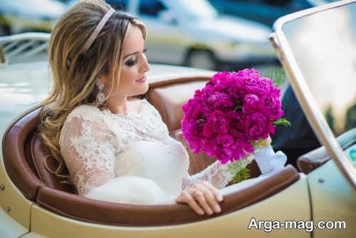 ژست عکس عروس با دسته گل در ماشین 
