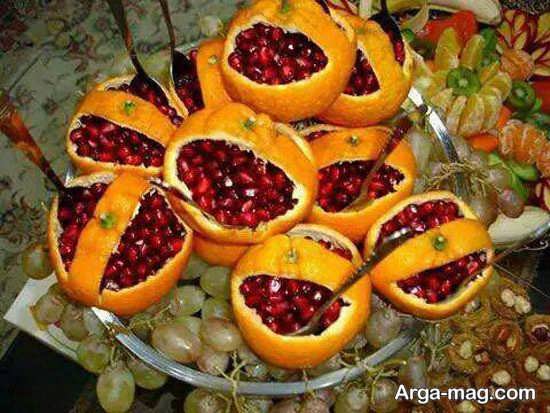 تزیین پرتقال با انار دون شده شب یلدا