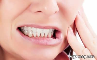 علایم بروز دندان قروچه