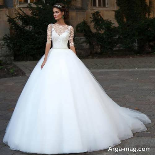 مدل لباس عروس با یقه هفت و دامن پف دار 