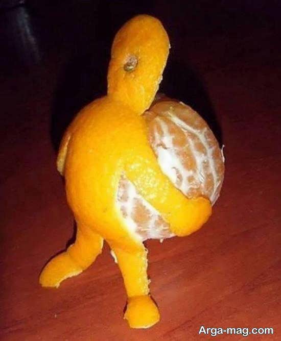 تزیینات میوه به شکل آدم با استفاده از نارنگی و پوست نارنگی